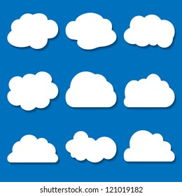 Set Of White Paper Clouds On The Blue Background