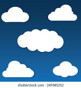set of white paper clouds on the blue background