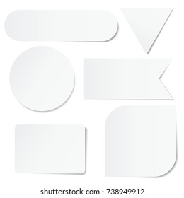 Set of white paper stickers of different shapes on white background. Round, square, rectangular, triangular.