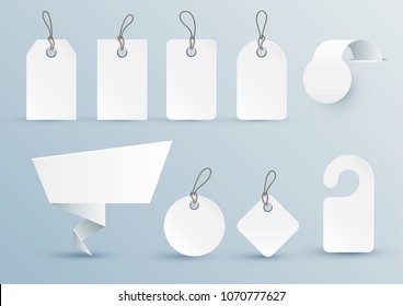 Set of white price tags of different shapes with design elements. Vector illustration