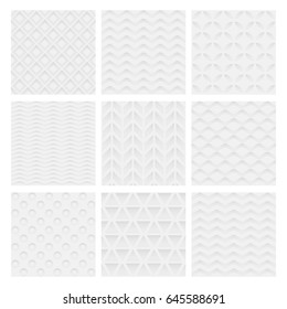 Set of white relief seamless patterns