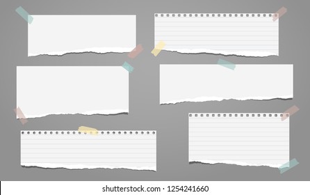 Set of white ripped lined notebook paper, torn note paper strips stuck on grey background. Vector illustration