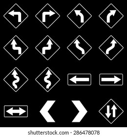 Set of white road traffic arrow signs on black background. Vector 