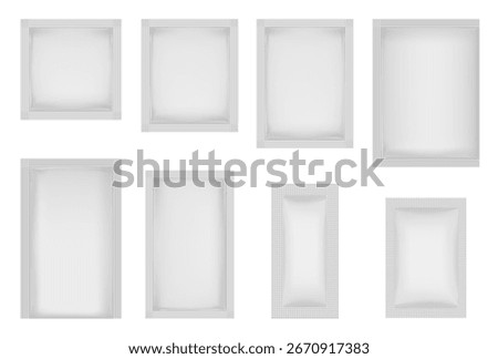 Set of white sachets in various shapes and sizes. Square and rectangular, vertical and horizontal. Cosmetic samples, skincare products, food supplements, tea bags, or single-use items