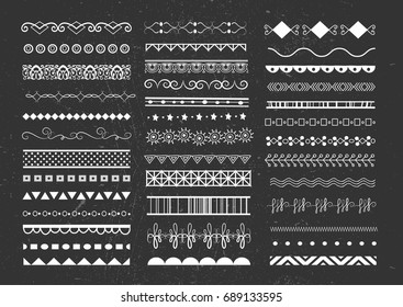 set of white seamless borders on dark background