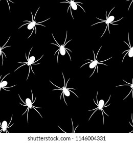 Set of white silhouettes spiders on black background