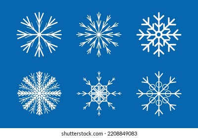 Set of white snowflake on blue background. Set of snowflakes isolated, vector eps10