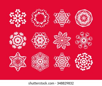 Set of  white snowflake on a red background. Christmas snowflakes. Holiday decorations. 