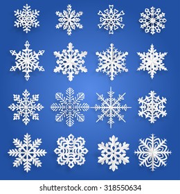 Set of white snowflakes cut out of paper