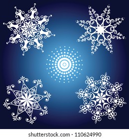 Set of white snowflakes on blue background, vector illustration