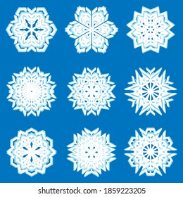 Set of white snowflakes on a blue background. Vector image