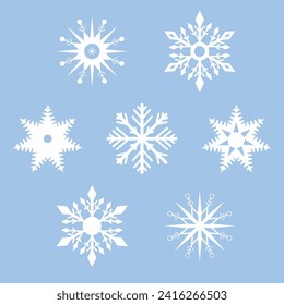 Satz weißer Schneeflocken auf blauem Hintergrund