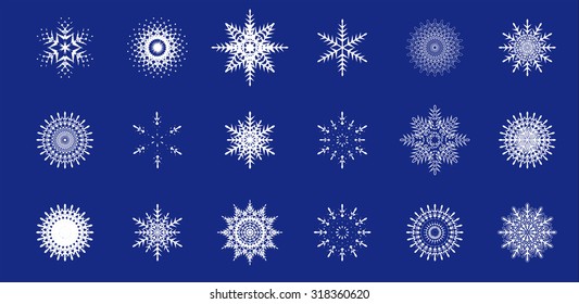 set of white snowflakes on a blue background
