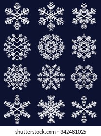 Set of white snowflakes on a blue background, vector