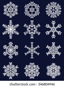 Set of white snowflakes on a blue background, vector