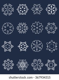 Set of white snowflakes on a blue background, vector