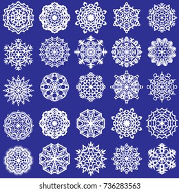 set of white snowflakes on a blue background for decoration and decoration
