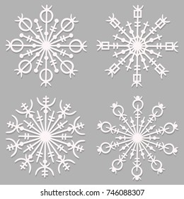 set of white snowflakes on a gray background