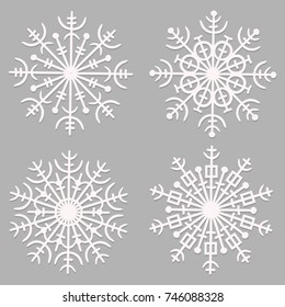 set of white snowflakes on a gray background
