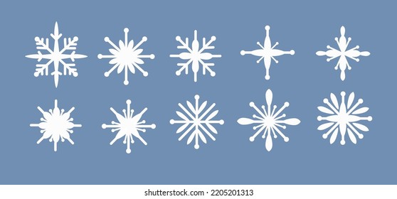 A set of white snowflakes of a simle shape