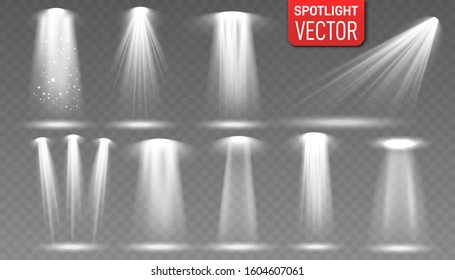Set of the white spotlight shines on the stage, scene, podium. Scene illumination collection. Spotlight with beam, illuminated spotlights for web design illustration. Bright lighting with spotlights. 