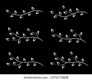 set of white tree branches with leaves