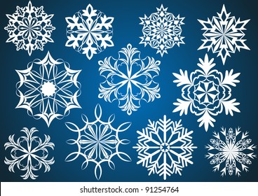 Set of white vector snowflakes isolated on dark blue background.