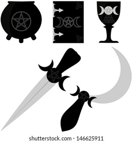 Set of the Wiccan tools: cauldron, book of shadows, goblet, ritual dagger athame, ritual sickle boline