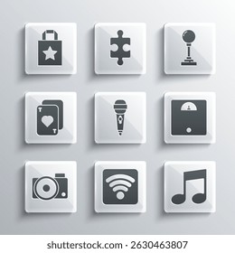 Set Wi-Fi wireless internet network, Music note, tone, Bathroom scales, Microphone, Photo camera, Playing cards, Paper shopping bag and Joystick for arcade machine icon. Vector