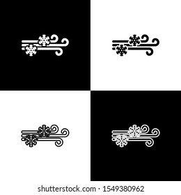 Set Wind and snow icon isolated on black and white background. Windy weather.  Vector Illustration