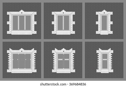 set of windows on gray brick wall