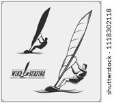 Set of windsurfing emblems, labels and badges. Surf design elements.
