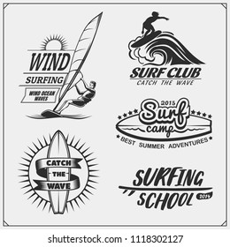 Set of windsurfing emblems, labels and badges. Surf design elements.