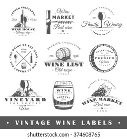 Set of wine labels. Elements for design on the wine theme. Collection of wine symbols: grape, bottle, barrel. Modern labels of wine. Emblems and logos of wine. Vector illustration 