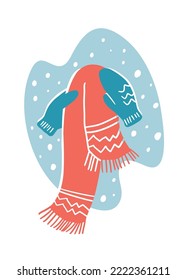 Un conjunto de accesorios de invierno para ropa interior. Las manos en mitones sostienen una bufanda con un patrón y borlas alrededor de los bordes. Ilustración en un gráfico plano al estilo de las caricaturas. Nieve contra el cielo azul.