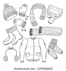 A set of winter and autumn clothing, wardrobe items doodles isolated on a white background. Hand drawn, simple outline illustration. It can be used for decoration of textile, paper.