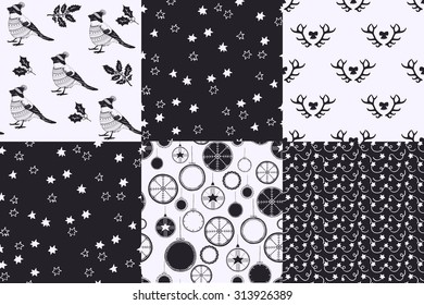Set winter collection of seamless patterns. Christmas collection. Bullfinches, stars, antlers, bows, holly sprig
