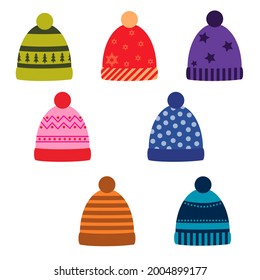 a set of winter colored hats with a pattern. vector isolated on a white background.