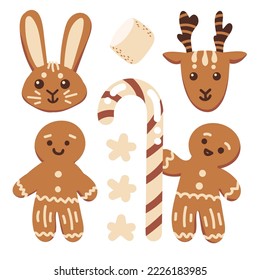 Set of winter gingerbread cookies in different shapes like men, deer, and rabbit with sweet cane and marshmallow