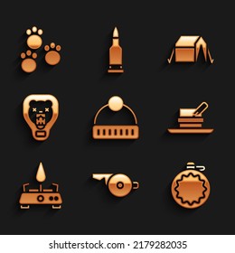 Set Winter hat, Whistle, Canteen water bottle, Hunter with feather, Camping gas stove, Bear head on shield, Tourist tent and Paw print icon. Vector