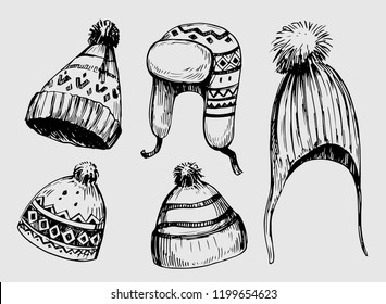 Set of winter hats. Hand drawn illustration converted to vector