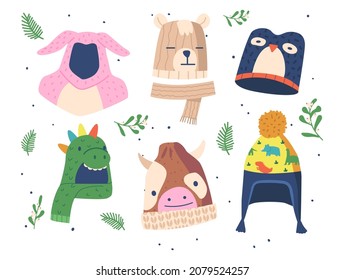 Set Of Winter Hats For Kids. Rabbit, Dino, Penguin And Bear With Cow Headwear Design For Cold Season. Knitted Caps For Baby Isolated On White Background. Cartoon Vector Illustration Icons, Clipart