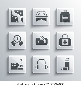 Set Winter headphones, Thermos container, First aid kit, Ice hockey goal, Shovel snowdrift, Medal, Route location and Christmas sweater icon. Vector