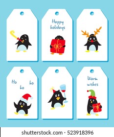 Set of winter holiday tags with cute penguins, vector gift labels for Christmas, New year