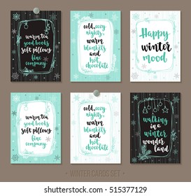 Set winter and holidays greeting cards with handwritten brush calligraphy and decorative elements. Decorative vector illustration for season invitations, cards, posters and flyers.
