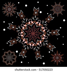 Set of winter New Year snowflakes in brown colors on black.
