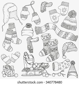 Set of winter sketches. warm clothes,  scarf, hats, mittens, socks. Hand-drawn vector illustration.