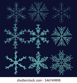 set with winter snowflake on dark background