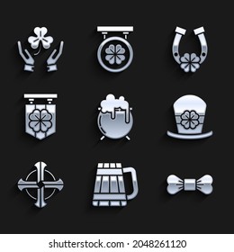 Set Witch cauldron, Wooden beer mug, Bow tie, Leprechaun hat and four leaf clover, Celtic cross, Street signboard with, Horseshoe and Human hands holding icon. Vector