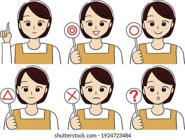 A set of a woman has the placard